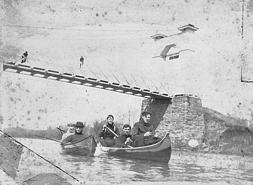 Old Photo of Men Rowing